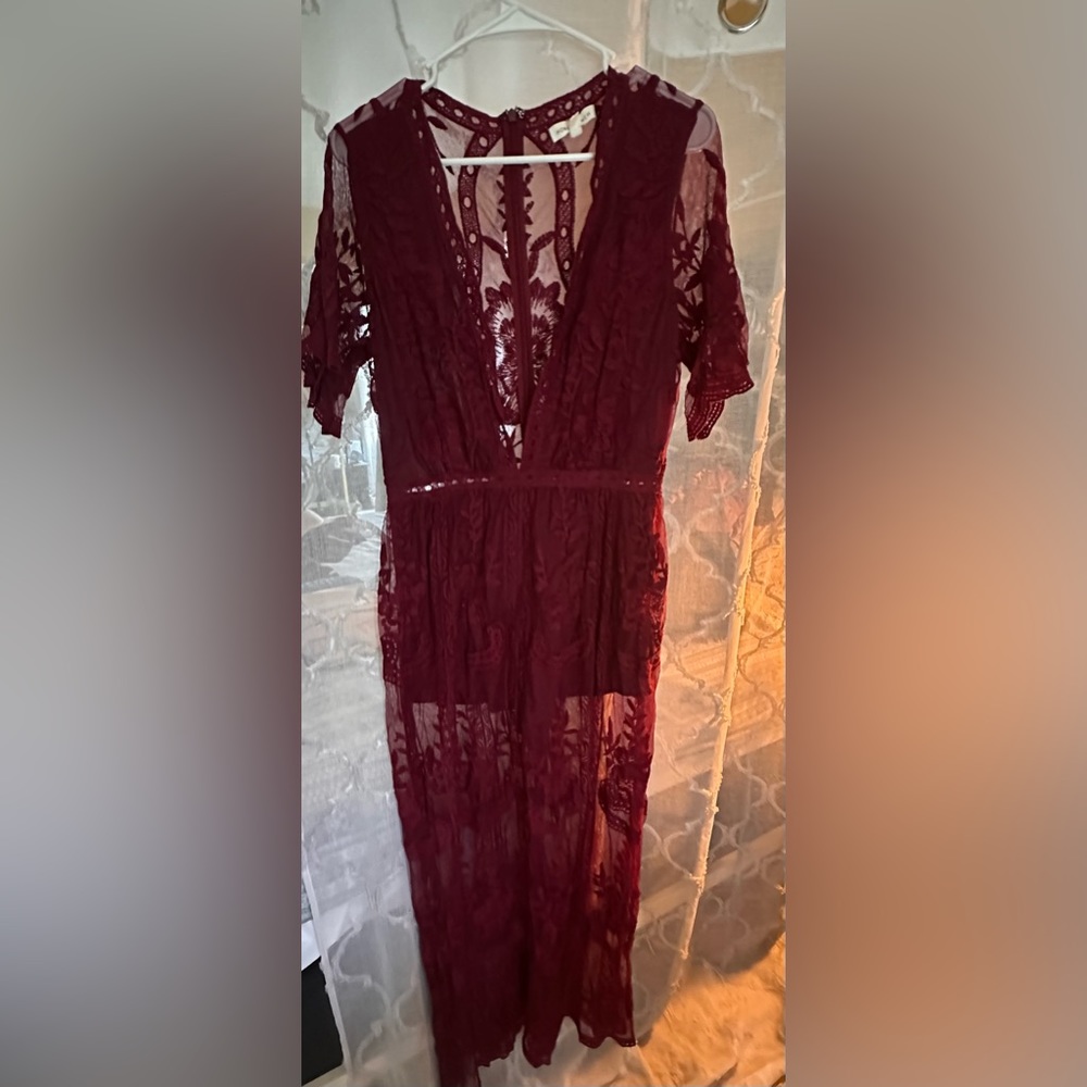 Romper with lace overlay. Shorts underneath.